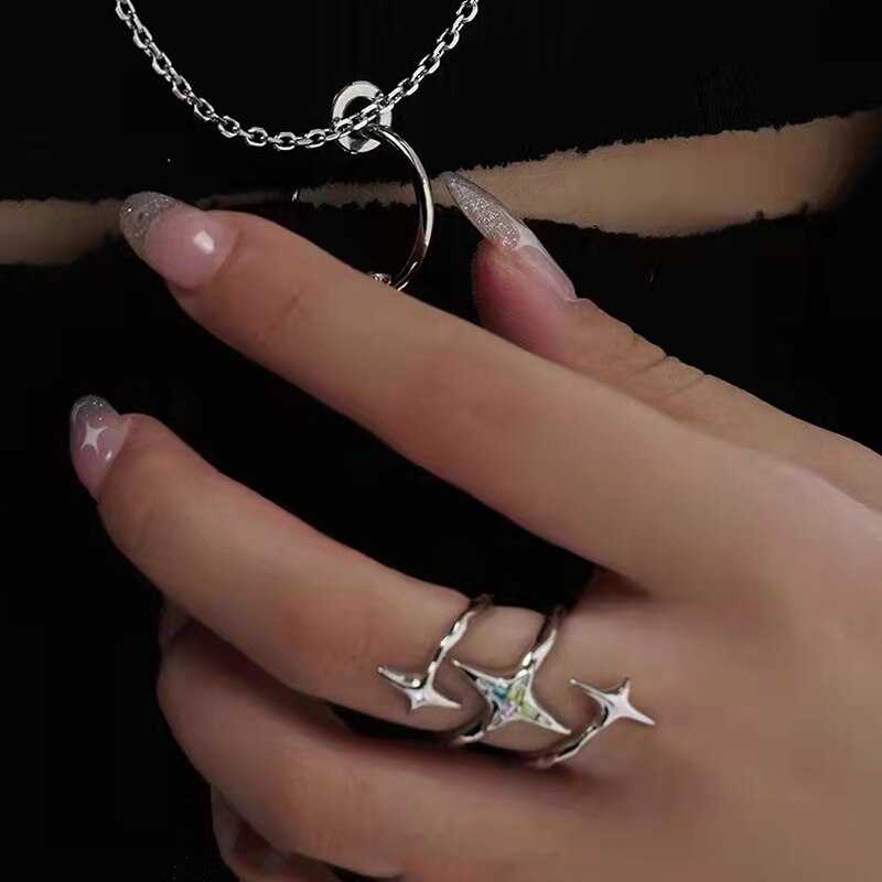 Shine Bright with our Star Cross Adjustable Ring Set